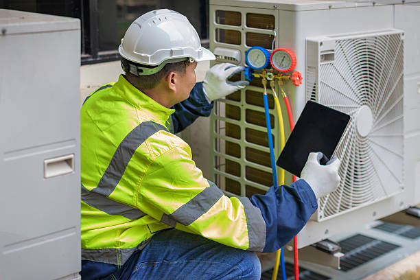 Professional Air Duct Cleaning technician working in Dalbo, MN
